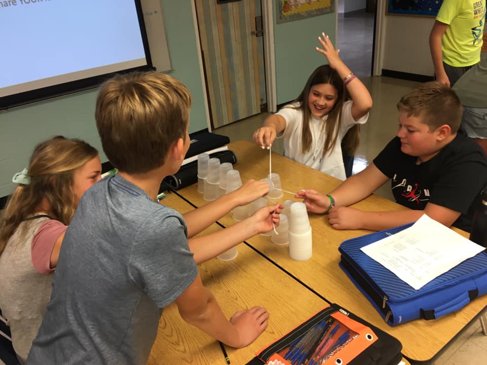 Middle School students in small group activity