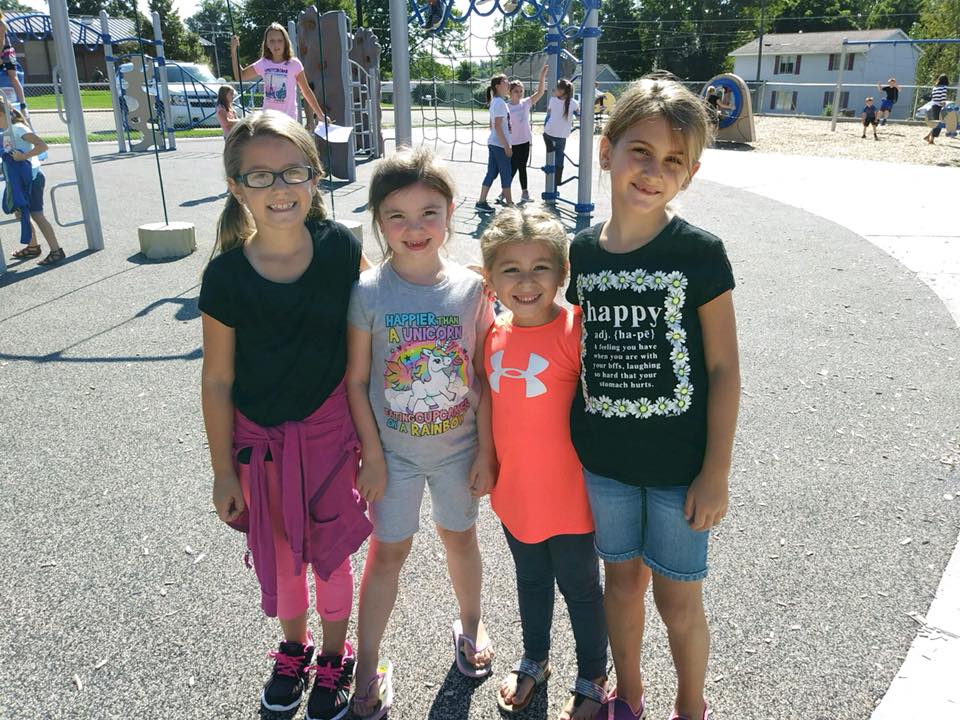 Elementary Students standing on playground