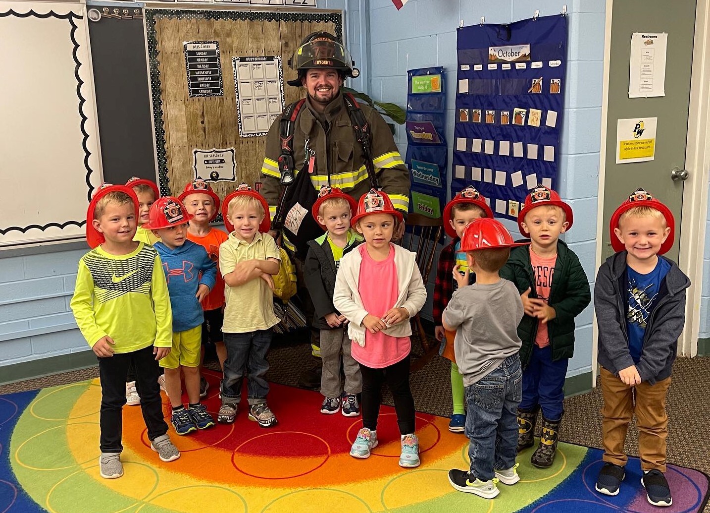 Elementary Students with Firefighter