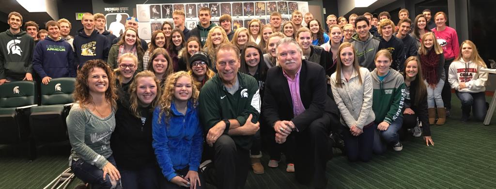 The Class of 2017 pose with Coach Izzo and Mr. Cotter during their trip to MSU.